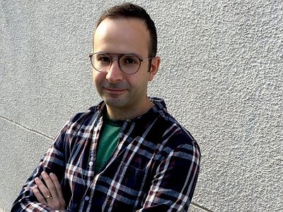 image of Fifteen Questions Literature Interview with Babak Lakghomi